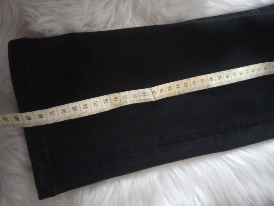 Spodnie czarne jeansowe Versace