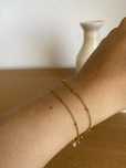 Pulseira dupla dourada