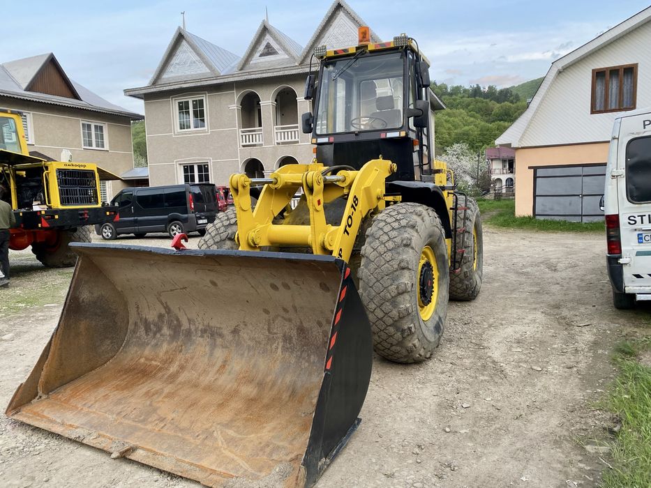 Амкадор ТО-18 навантажувач