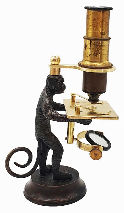 Brass reproduction of a “monkey microscope”