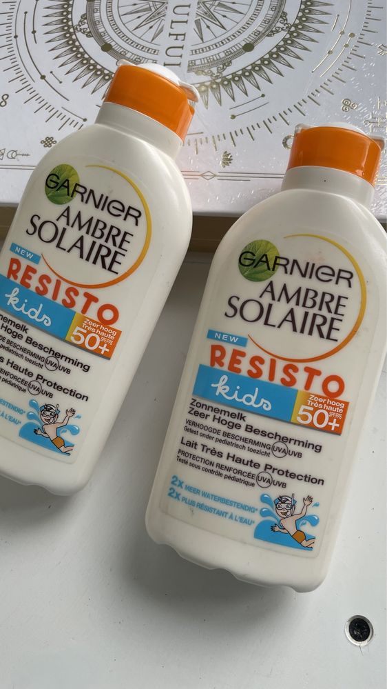 Garnier Ambre Solaire Resiato mleczko ochronne dla dzieci SPF 50+