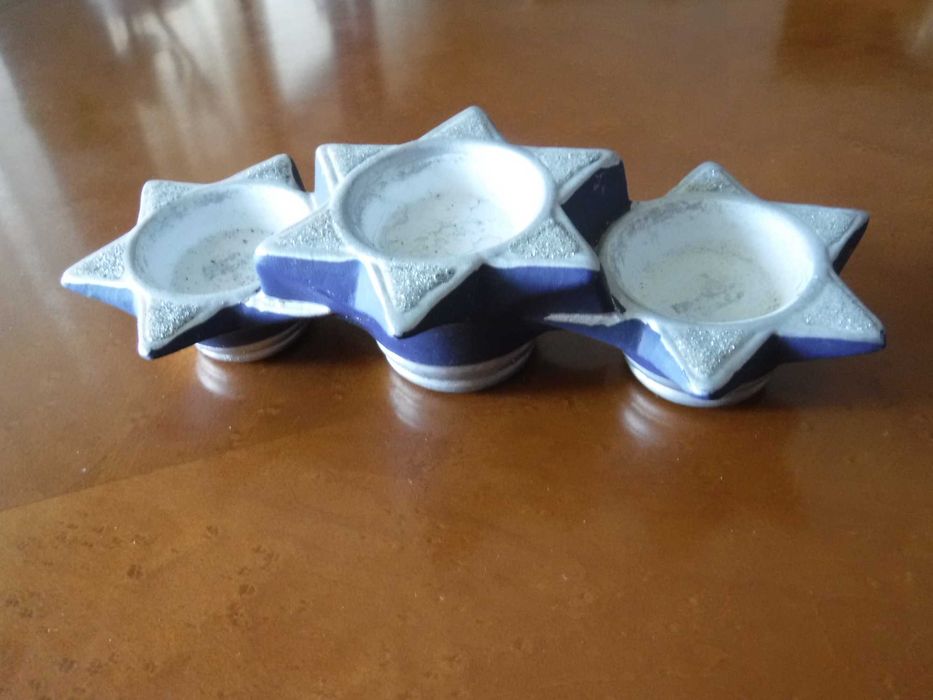 Candelabro três estrelas