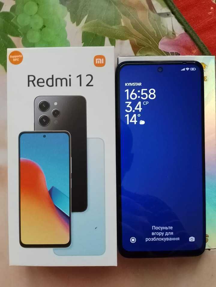 Продам новый телефон с чехлом Redmi 12 4-128