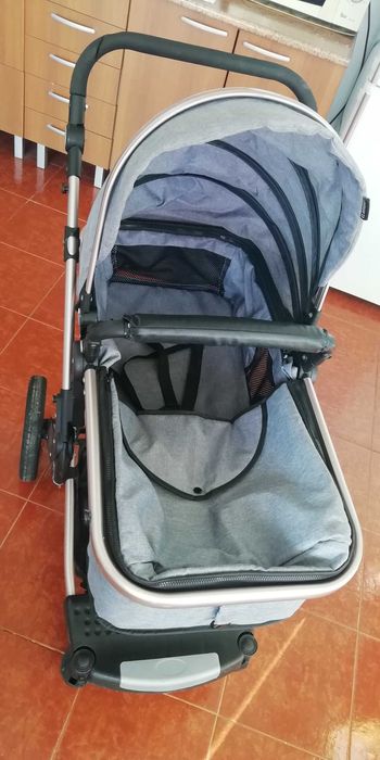 Carro com cadeira e alcofa