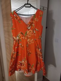 Sukienka brzoskwiniowa w kwiaty 44