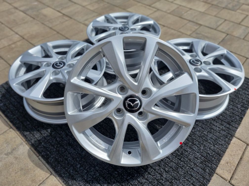 Mazda 2 felgi 15 " aluminiowe nowe 4x100 alufelgi Srebrne / Czarne