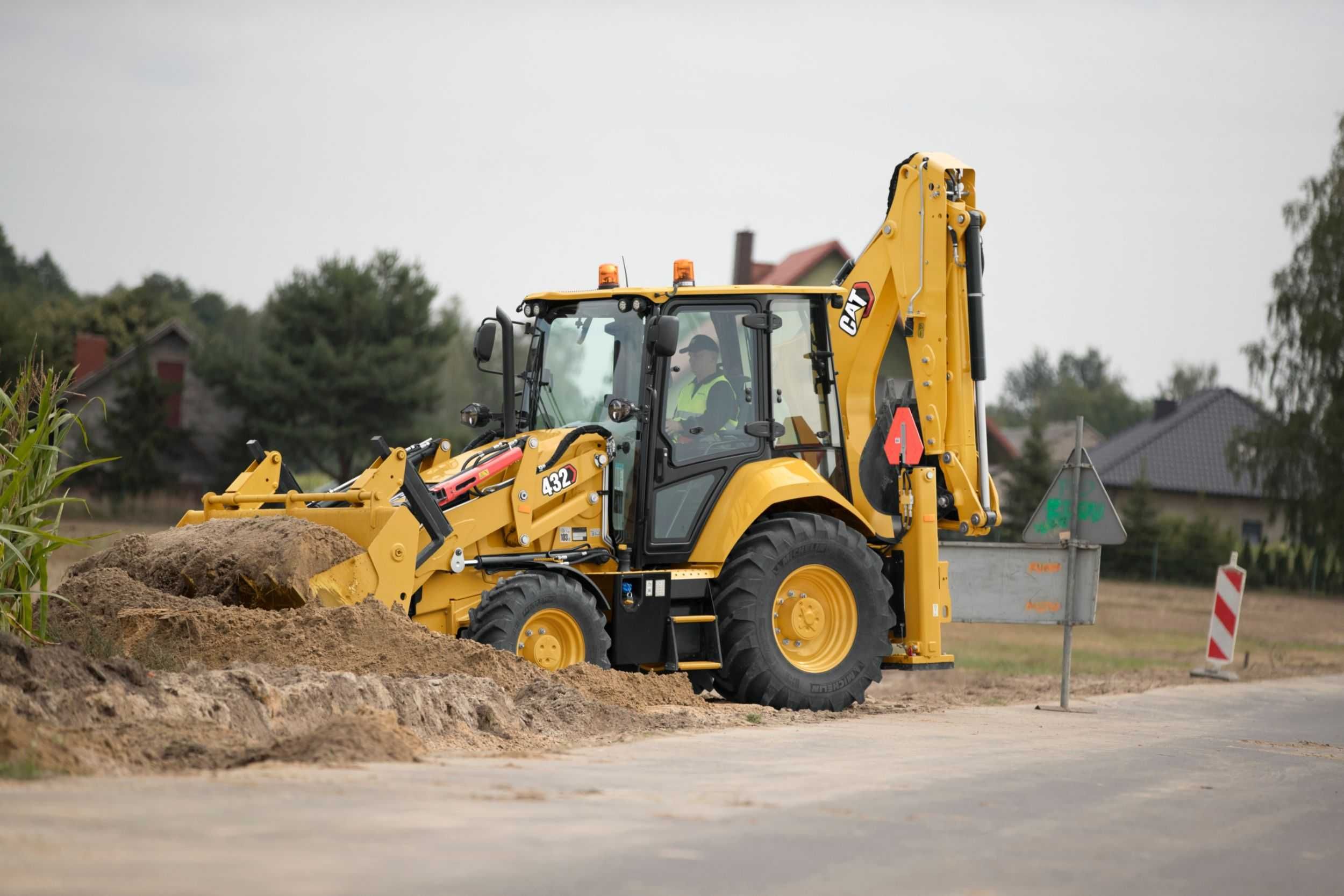 Usługi koparko-ładowarką CAT 432E