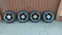 Koła letnie 195/50 R16 88V Falken ZIEX ZE914, Felgi aluminiowe Momo