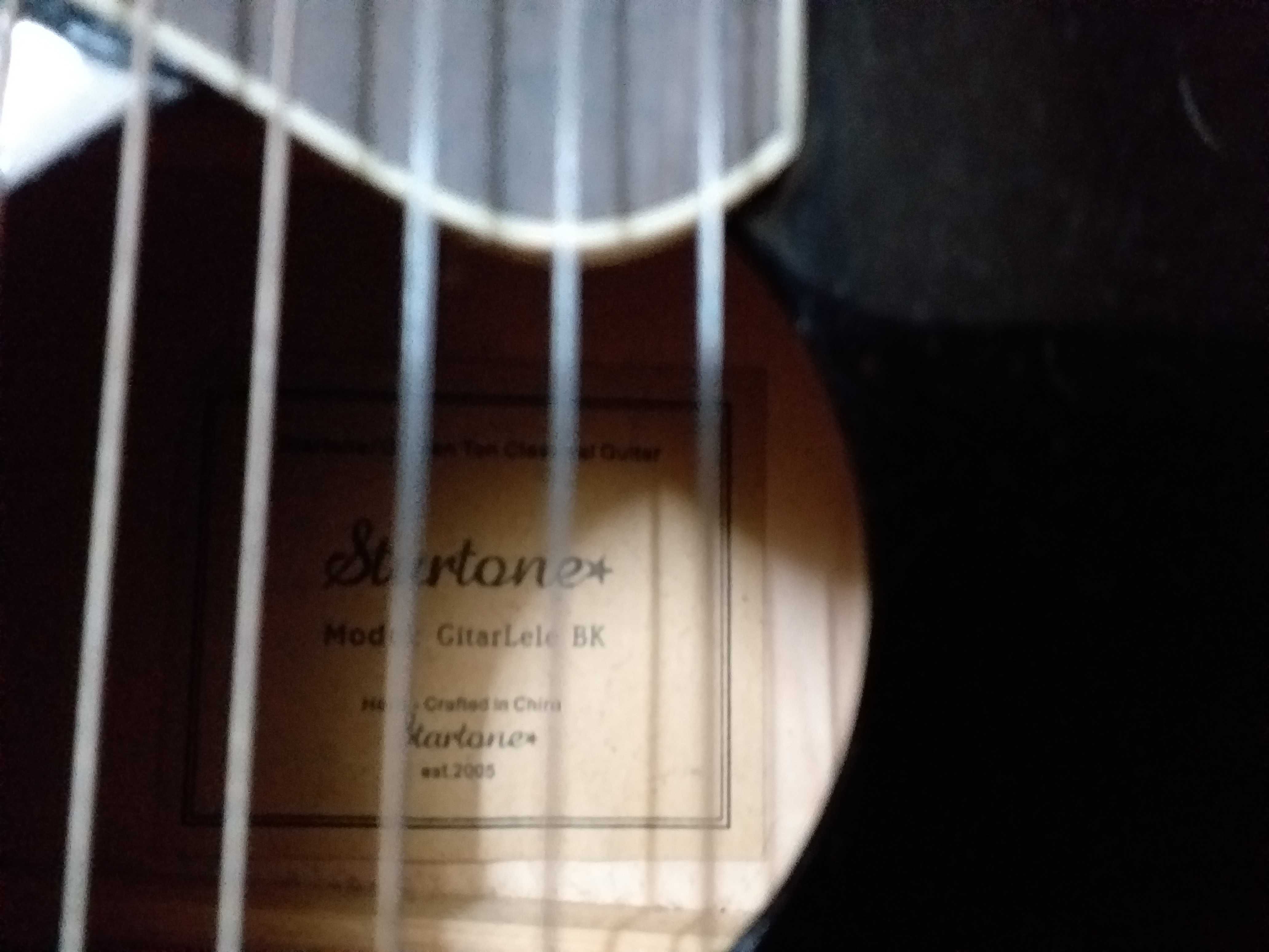 Vendo guitalele impecável