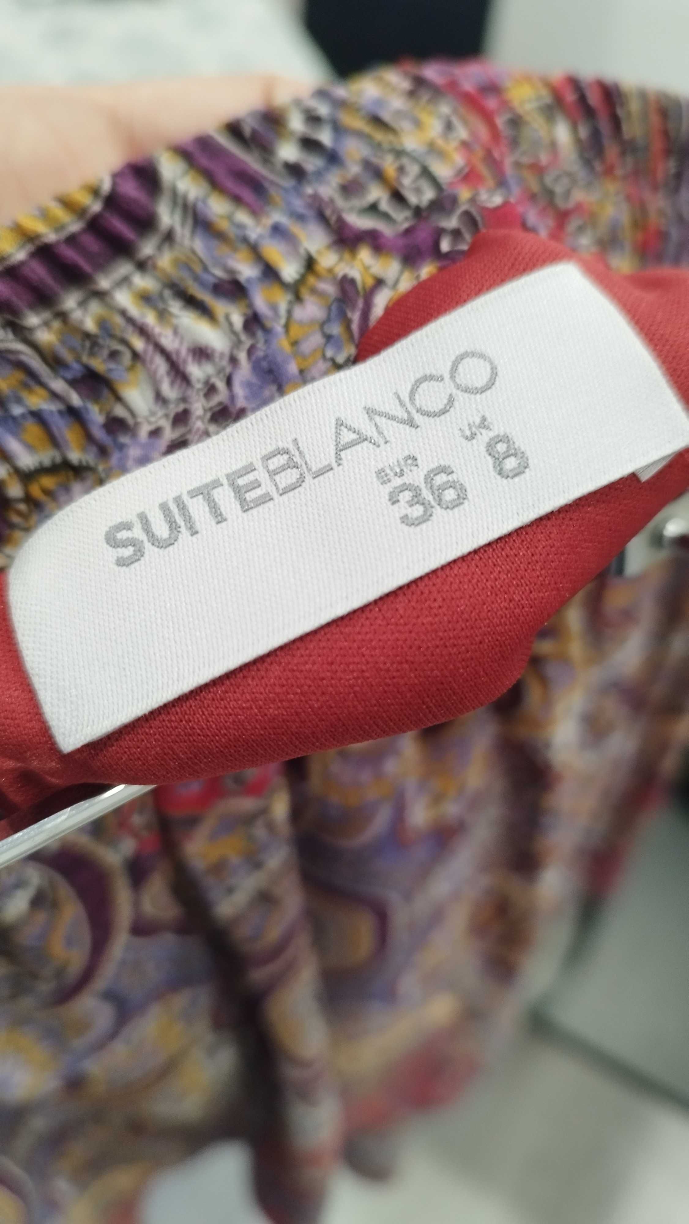 Saia curta assimétrica