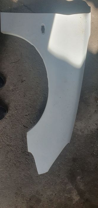 Guarda lamas direito peugeot 206