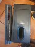 Sobwoofer LG i odtworzacz dvd LG.