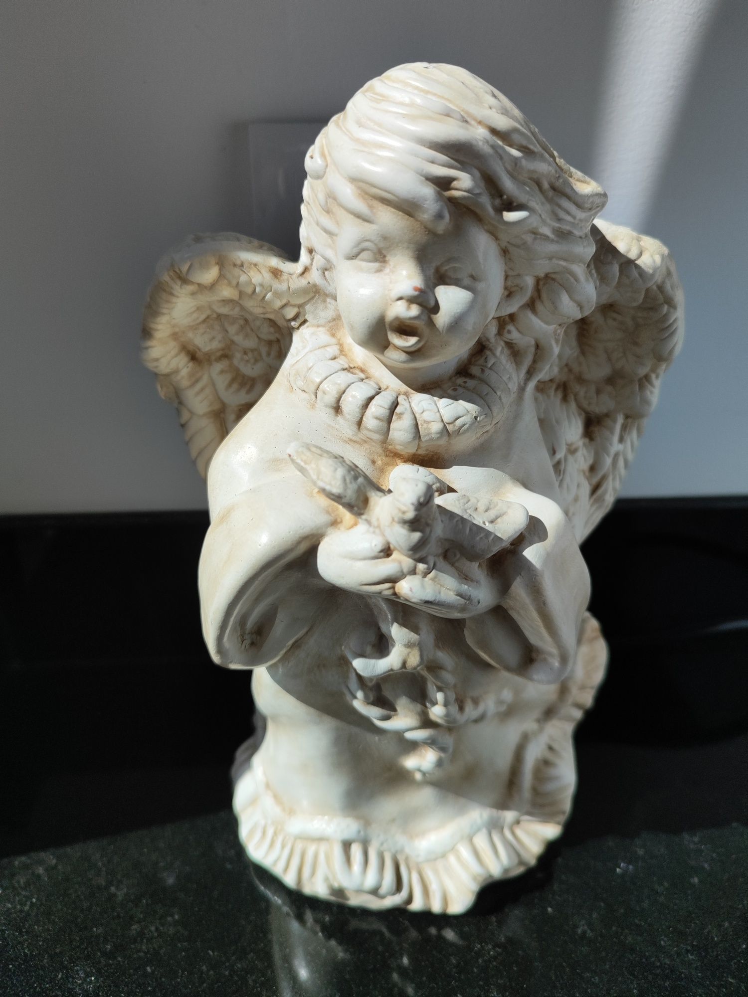 estatueta de anjo