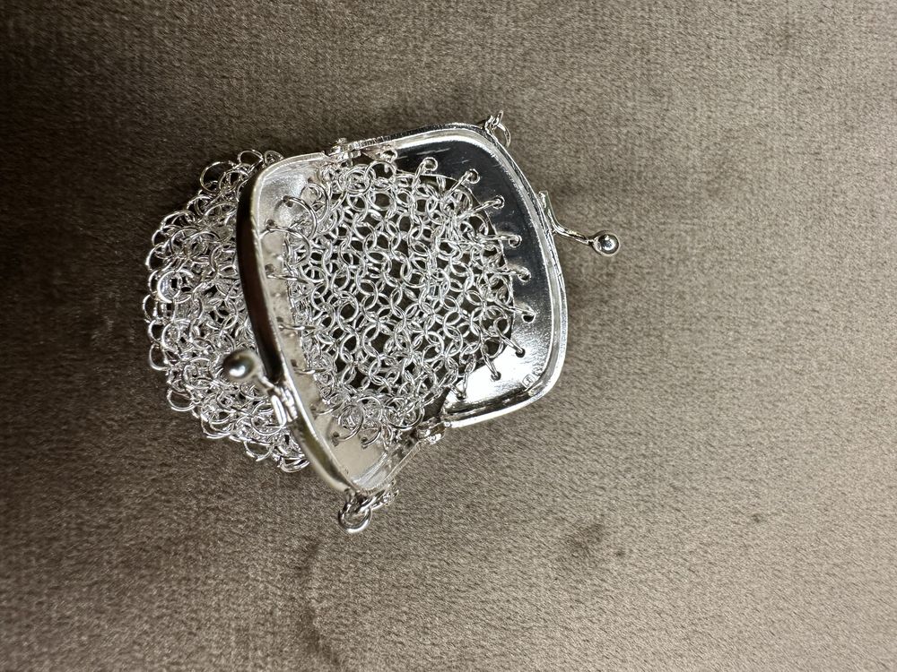 Medalha porta moedas em prata