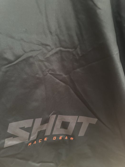 Casaco Shot race gear