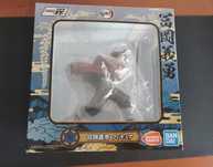 Figura Bandai Namco Giyu Tomioka de Demon Slayer (NOVA) )