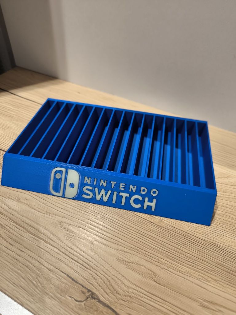 Stojak podstawka na gry Nintendo Switch napis świecący