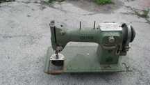 Maquina da costura da oliva
