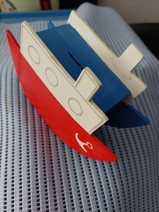 Passpartout, mealheiro e dois cabides