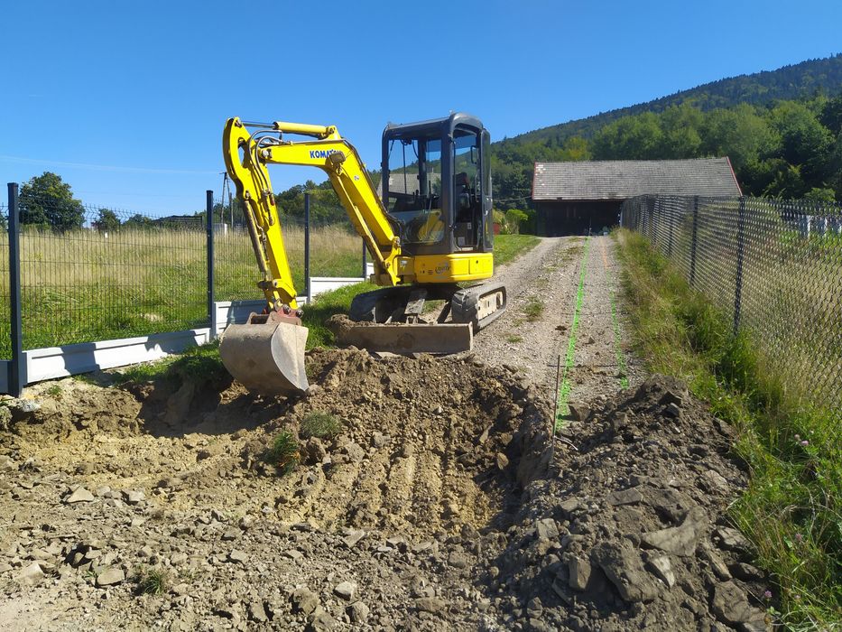 Koparka wozidlo usługi koparką wozidłem  wiertnica pod słupki