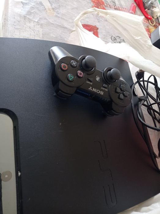 Ps3 preta com comando