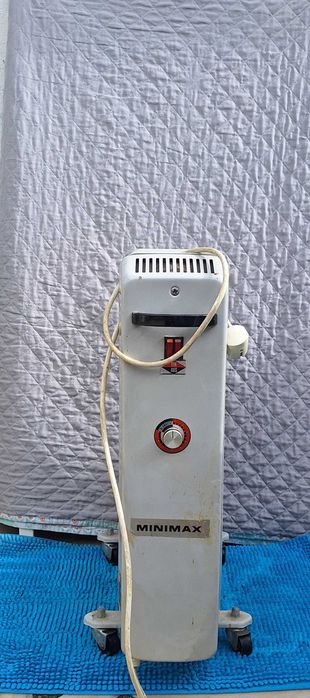 Aquecedor a óleo  a funcionar perfeitamente