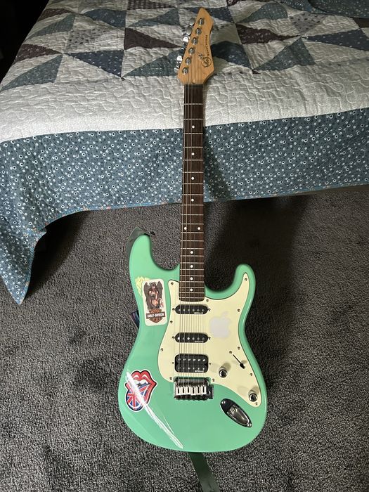 Поодам электрогитару