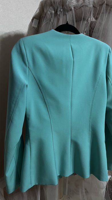 Жіноча джинсова жилетка