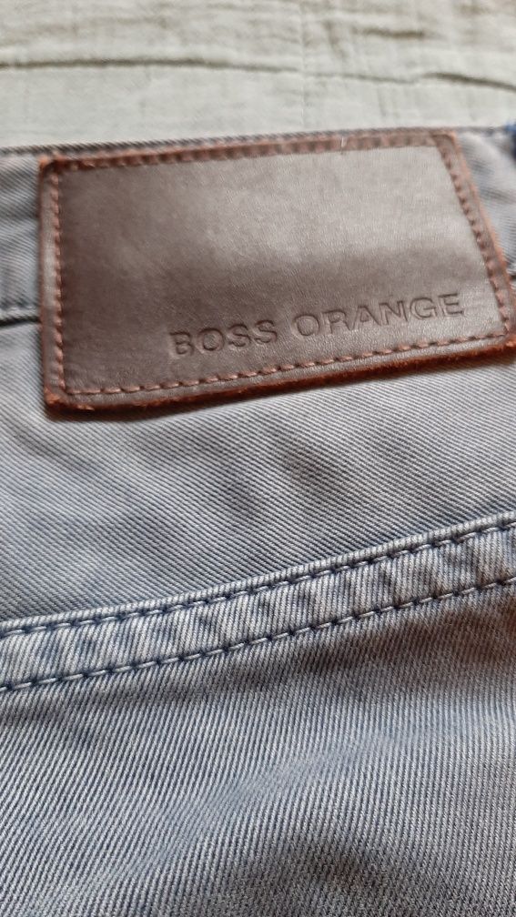 Spodnie , dżinsy firmy Hugo Boss, Orange 24 Barcelona. Szaro niebieski