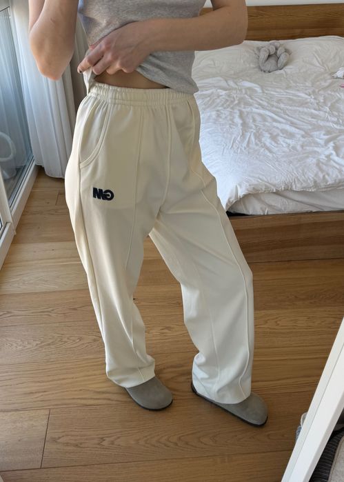 Білі бежеві брюки штани