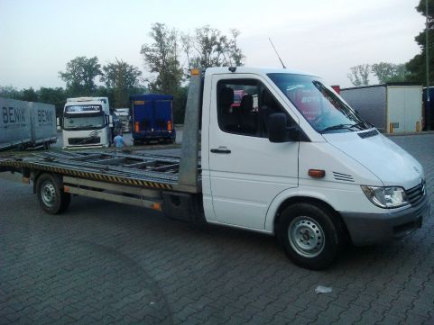 Auto laweta Transport Niemcy Auto Pomoc Tanio Dzwoń 24H.