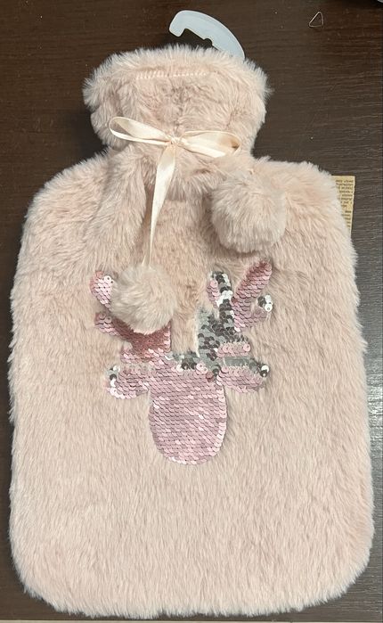 Termofor nowy z cekinowym motywem.