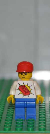 F0048. Figurka LEGO  - trn067 - Railway Brickster with Red Brick