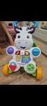 Pchacz zebra fisher price smyk interaktywny grający