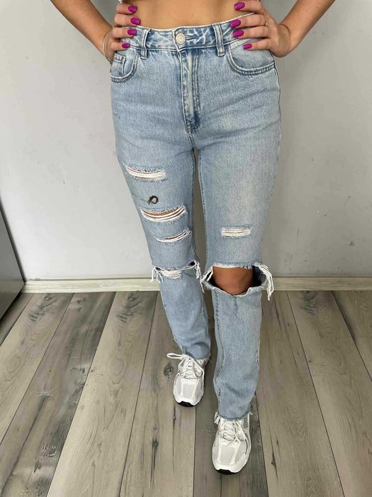 Spodnie jeansowe dżinsowe dżinsy jeansy niebieskie z dziurami straight