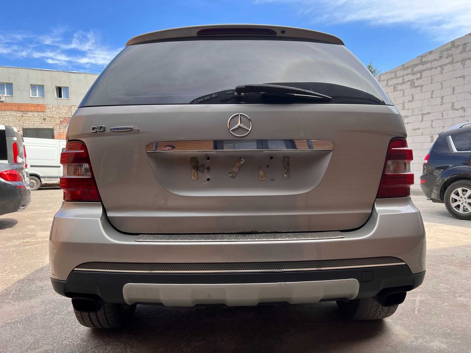 Задний бампер Мерседес ML W164 задній бампер МЛ 164 Дорестайл