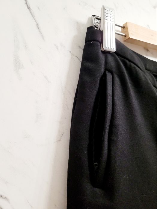 Eleganckie spodnie cygaretki premium suwaki po bokach styl preppy