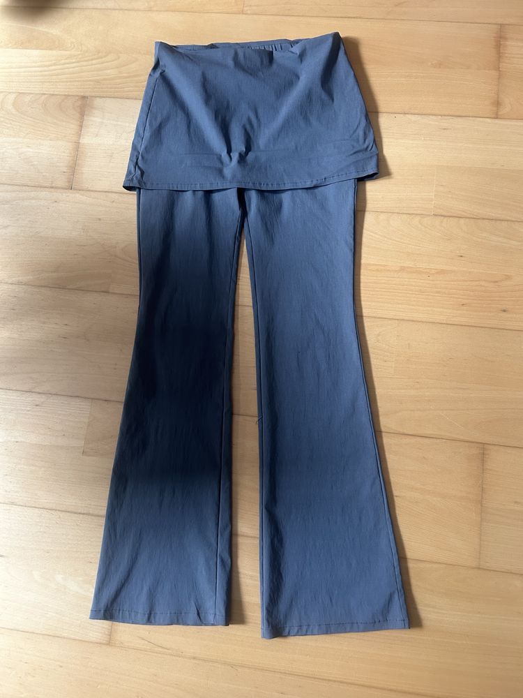 Calças flare com saia Pull&Bear