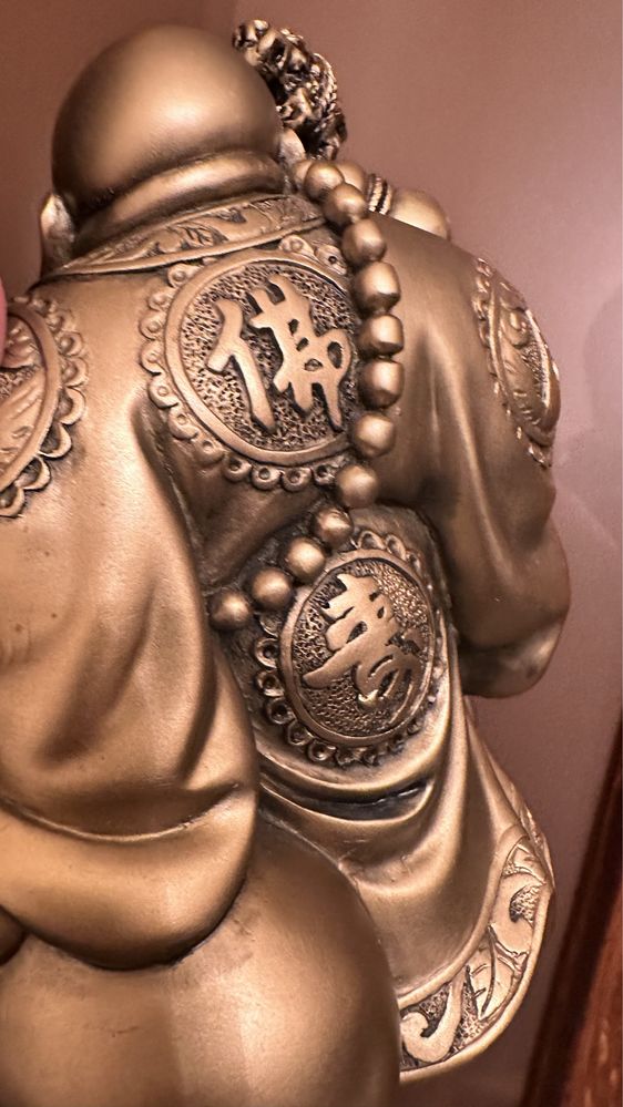 Статуетка будда