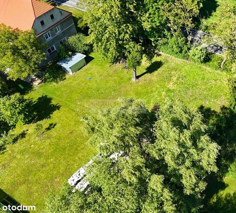 Mieszkanie z potencjałem i dużą działką budowlaną!
