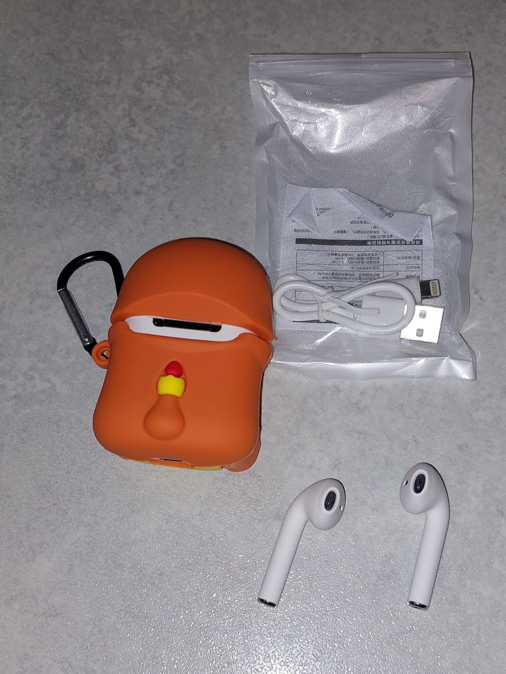 Nowe zapakowane słuchawki bezprzewodowe Pokemon Charmander