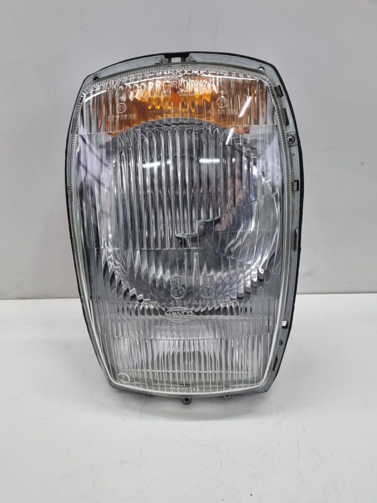 mercedes w114 w115 reflektor lampa nowy oryginalny hella