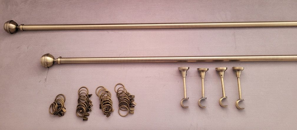 Karnisz okienny metalowy w kolorze złotym z żabkami