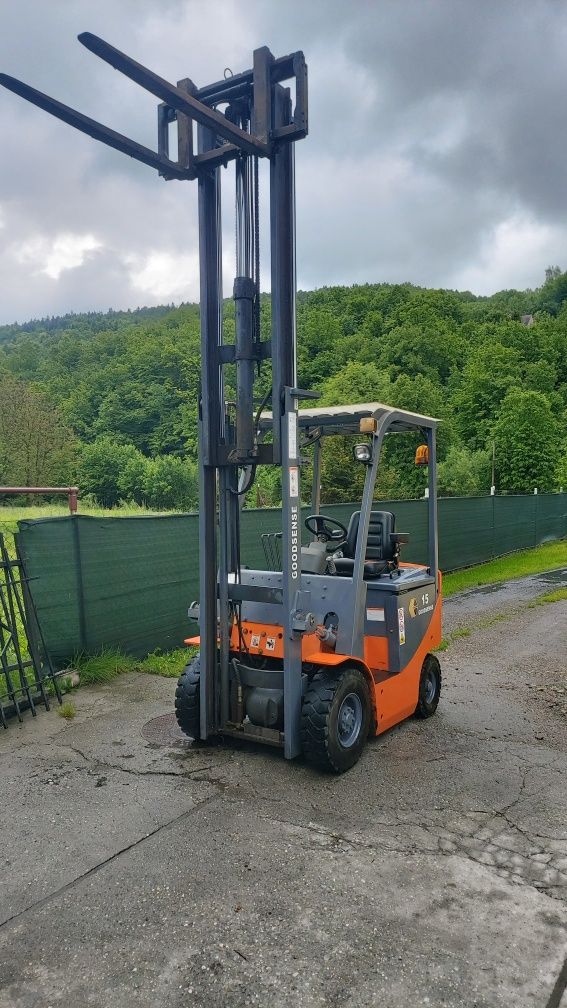 Wózek widłowy elektryczny 1.5t. Wolny skok,Przesuw boczny 2011rok