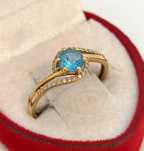 Złoty pierścionek APART Topaz diamenty Pr.585 W:1,65gr Roz.15