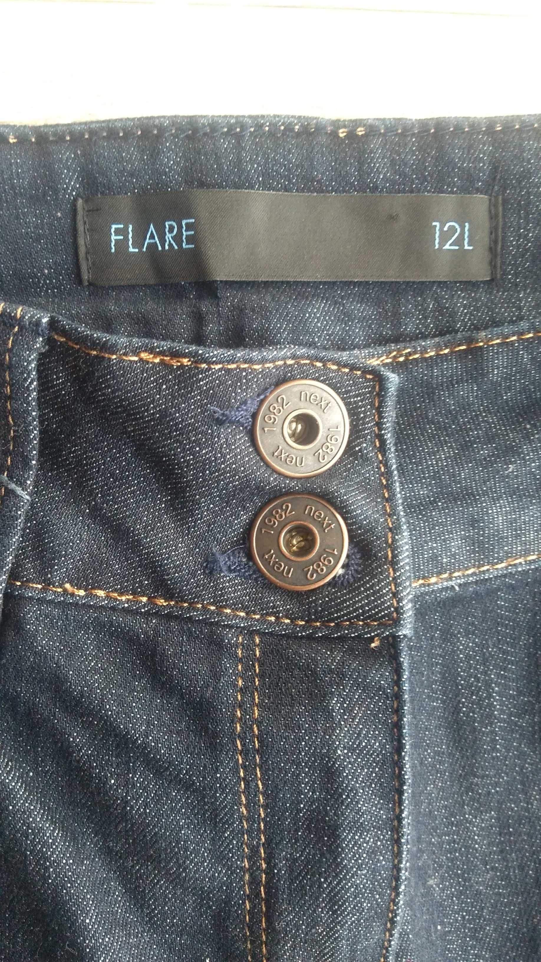 Ciemnogranatowe ładne jeansowe  spodnie jeansy dżinsy Next Flare 40