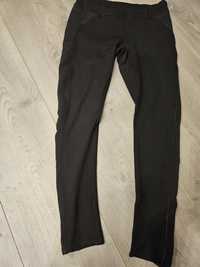 Czarne spodnie legginsy r L