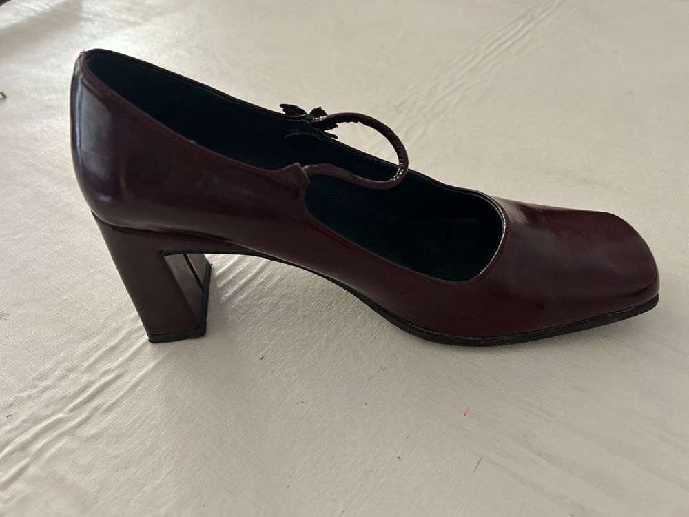 Carteira e sapatos como novos