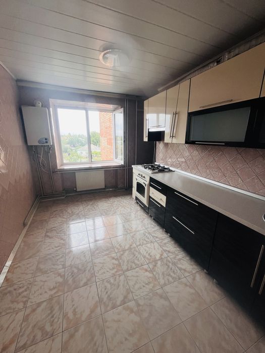 Продаж квартири з гаражем