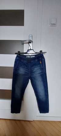 Spodnie jeansowe ocieplane 134